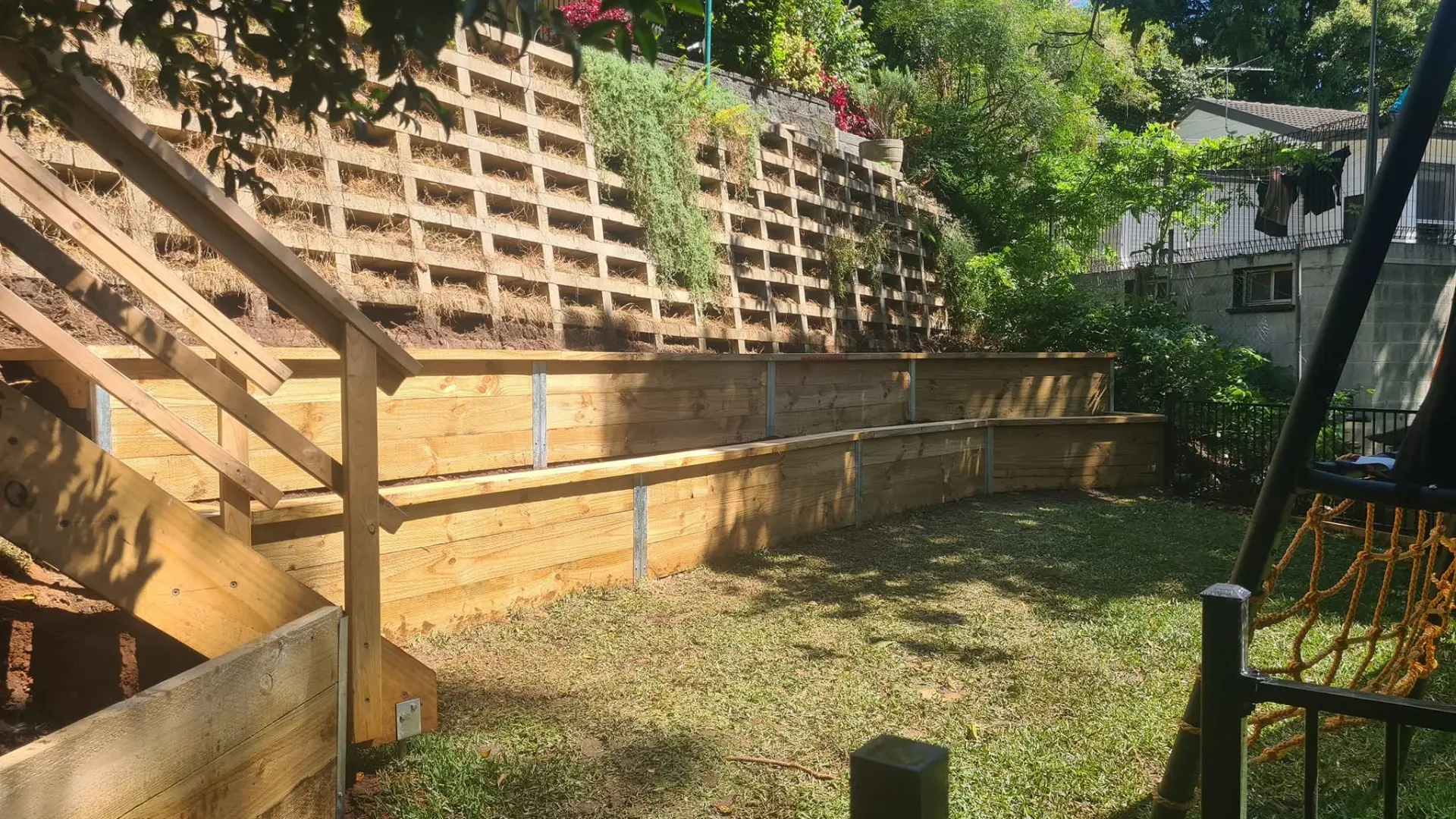 Engineered block retaining wall completed by Retain by Theo across the Illawarra