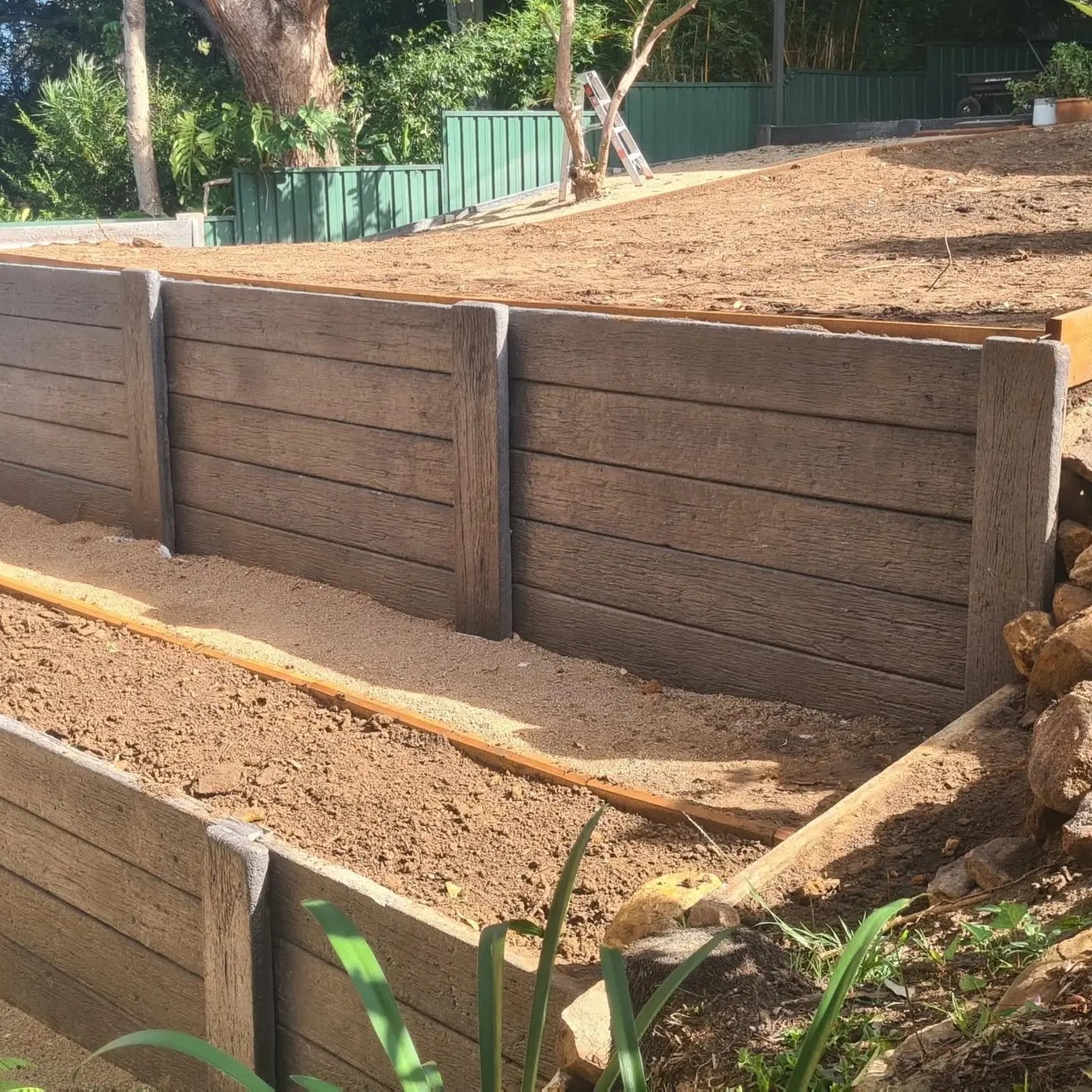 Concrete sleeper retaining wall built by Retain by Theo in Wollongong