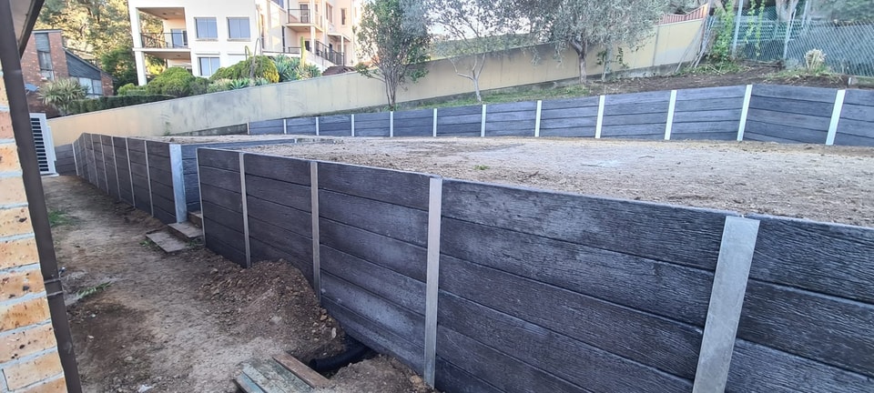Concrete Sleeper Retaining Walls designed and built by Retain by Theo across Wollongong and the Illawarra