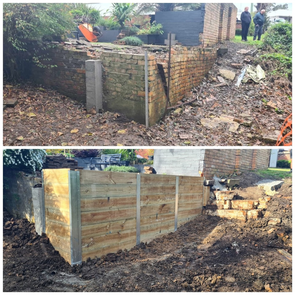 Failed brick wall replaced with a treated timber sleeper retaining wall