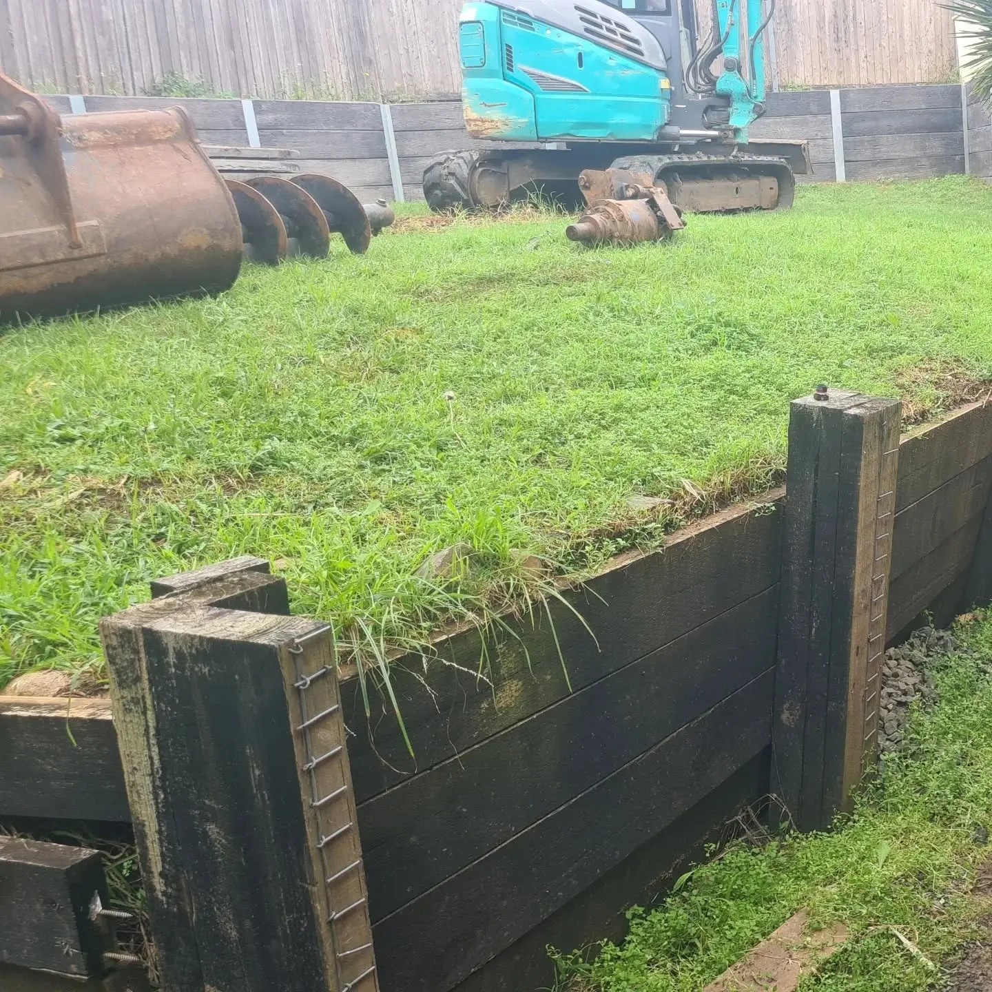 Retaining wall construction underway on a residential block in Huntley